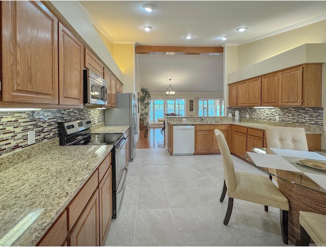 kitchen with ornamental molding, light stone countertops, decorative backsplash, a peninsula, and appliances with stainless steel finishes