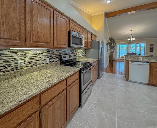 kitchen featuring decorative backsplash, appliances with stainless steel finishes, brown cabinets, light stone counters, and ornamental molding