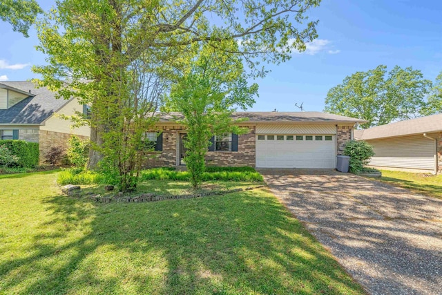 111 Pamela Ln, Sherwood, AR 72120 - ranch-style house with brick siding, driveway, a front yard, and a garage