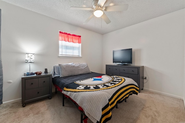 111 Pamela Ln, Sherwood, AR 72120 - bedroom featuring light colored carpet, baseboards, a ceiling fan, and a textured ceiling