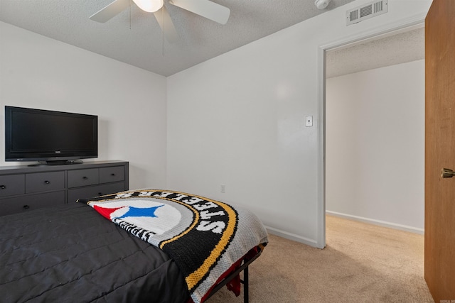 111 Pamela Ln, Sherwood, AR 72120 - carpeted bedroom with baseboards, a ceiling fan, visible vents, and a textured ceiling