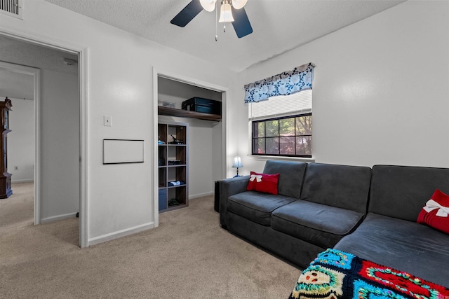 111 Pamela Ln, Sherwood, AR 72120 - living room featuring baseboards, a ceiling fan, carpet flooring, and visible vents