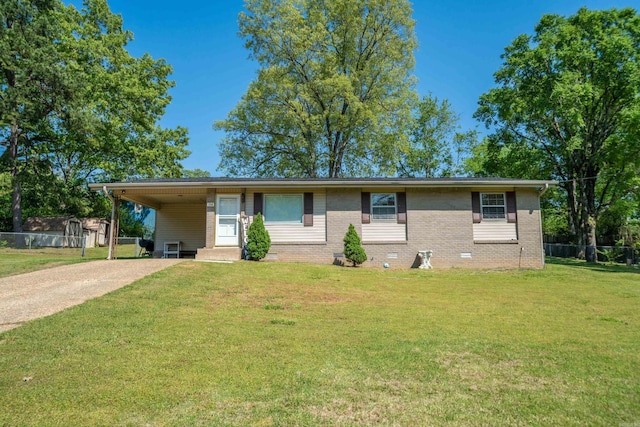 view of front of house featuring crawl space, a front lawn, driveway, a carport, and fence