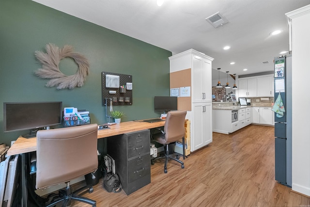 office area with visible vents, recessed lighting, and light wood-style floors