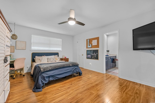 bedroom featuring light wood finished floors, baseboards, and a ceiling fan