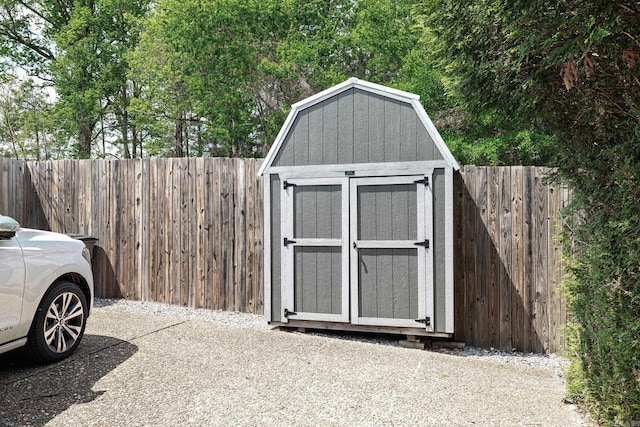 view of shed featuring a fenced backyard