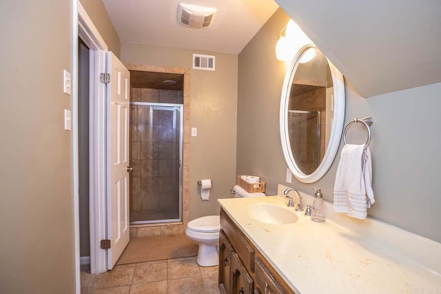 bathroom featuring a shower stall and visible vents