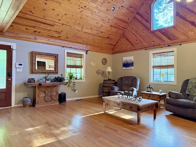 living room featuring wood ceiling, wood finished floors, baseboards, and high vaulted ceiling