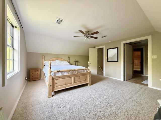 bedroom with visible vents, carpet flooring, and baseboards