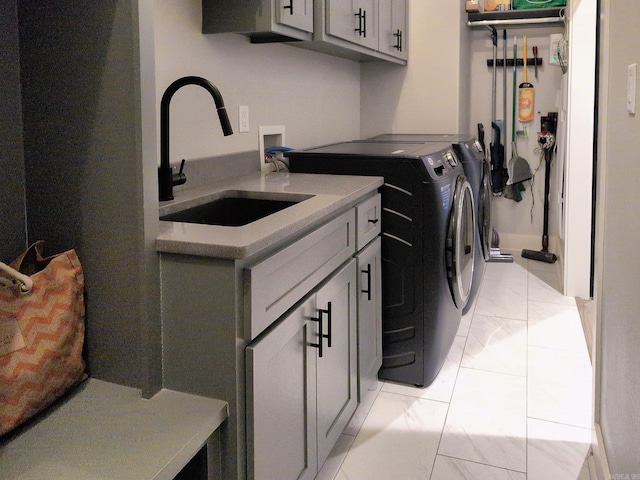 157 Manitou Dr, Maumelle, AR 72113 - laundry area with marble finish floor, cabinet space, washer and dryer, and a sink