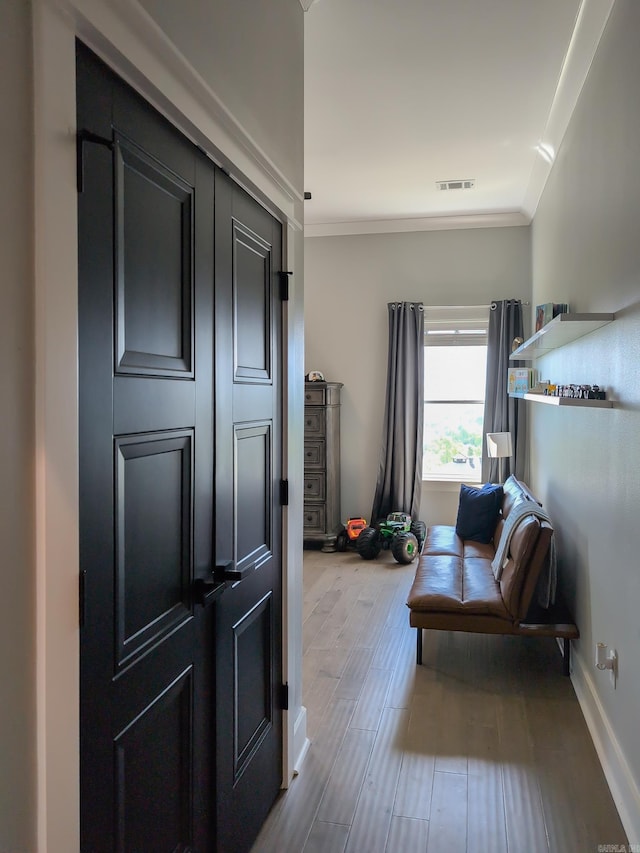 157 Manitou Dr, Maumelle, AR 72113 - living area featuring visible vents, wood finished floors, and ornamental molding