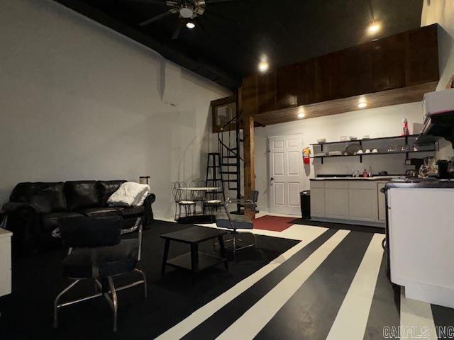 107 N Marr St, Pocahontas, AR 72455 - interior space featuring ceiling fan, vaulted ceiling, and stairway