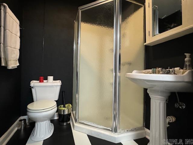 107 N Marr St, Pocahontas, AR 72455 - bathroom with toilet and a stall shower