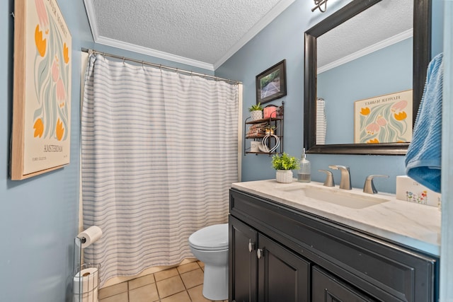 full bath featuring tile patterned floors, toilet, vanity, ornamental molding, and a textured ceiling