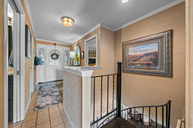 hallway featuring an upstairs landing, light tile patterned floors, and crown molding