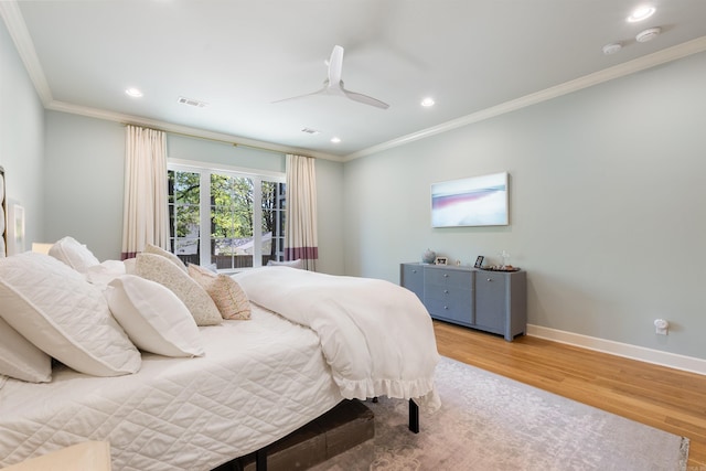 bedroom with recessed lighting, light wood-style flooring, visible vents, and crown molding