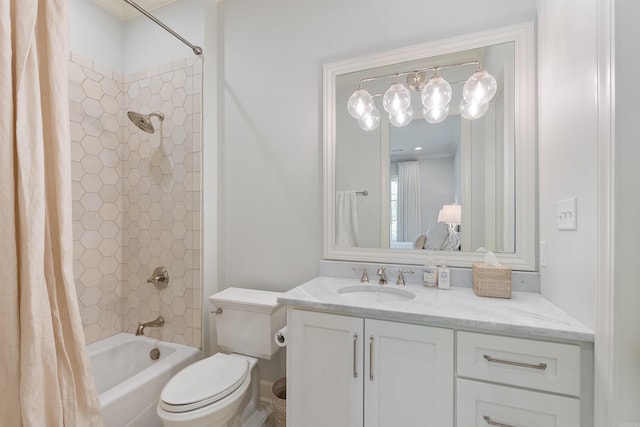 full bath with shower / tub combo, toilet, and vanity