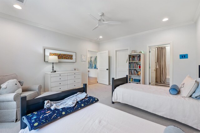 bedroom with a ceiling fan, crown molding, ensuite bathroom, carpet floors, and recessed lighting