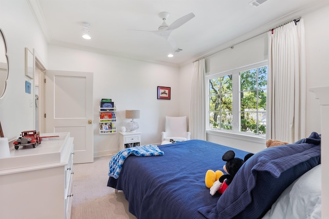 bedroom featuring ceiling fan, visible vents, crown molding, and light carpet