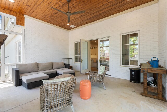 view of patio featuring ceiling fan and an outdoor living space