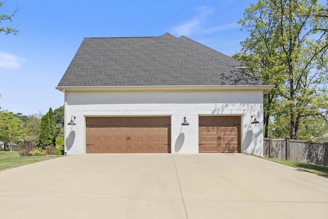 garage featuring fence