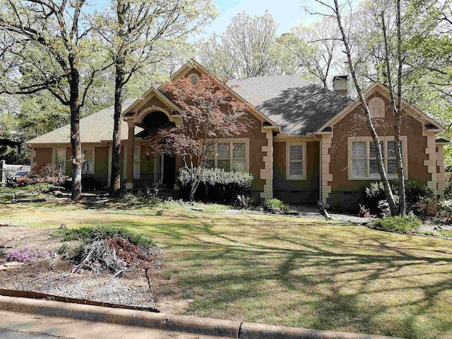 22 Talais Dr, Little Rock, AR 72223 - single story home with a chimney, stucco siding, a shingled roof, and a front yard
