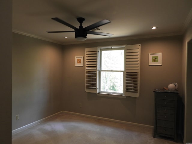 22 Talais Dr, Little Rock, AR 72223 - spare room with baseboards, a ceiling fan, carpet flooring, and crown molding