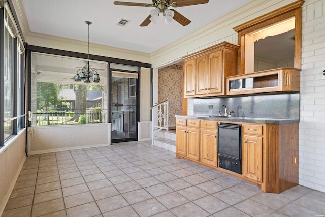 118 Grandview Dr, Hot Springs, AR 71913 - kitchen featuring open shelves, ceiling fan with notable chandelier, light tile patterned floors, backsplash, and visible vents