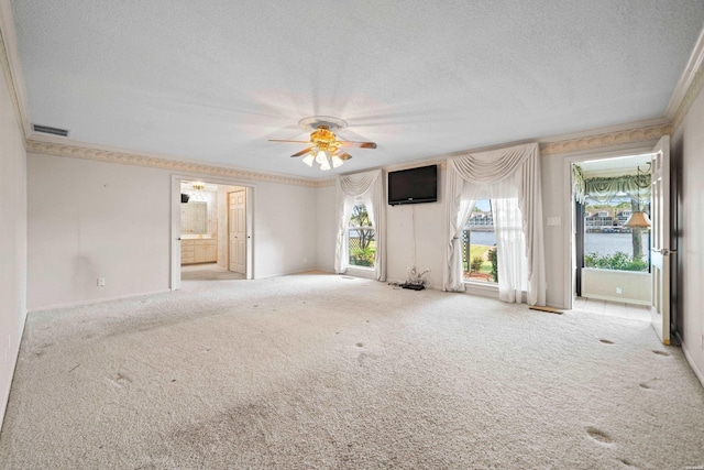 118 Grandview Dr, Hot Springs, AR 71913 - spare room featuring ornamental molding, a textured ceiling, visible vents, and carpet
