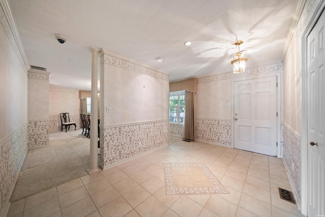 118 Grandview Dr, Hot Springs, AR 71913 - tiled spare room featuring visible vents, a wainscoted wall, crown molding, and wallpapered walls