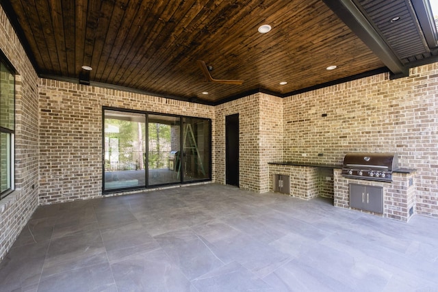 219 Abington Cir, Little Rock, AR 72223 - view of patio with a grill, exterior kitchen, and a ceiling fan