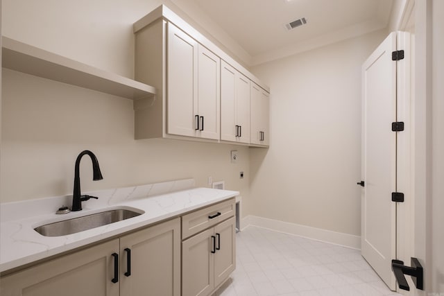 219 Abington Cir, Little Rock, AR 72223 - laundry area with a sink, cabinet space, hookup for an electric dryer, hookup for a washing machine, and baseboards