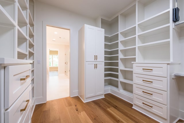 219 Abington Cir, Little Rock, AR 72223 - walk in closet featuring wood finished floors