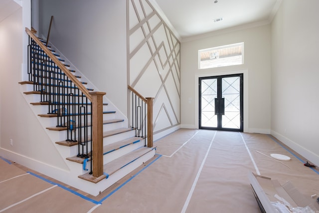 219 Abington Cir, Little Rock, AR 72223 - entrance foyer with a towering ceiling, visible vents, stairway, crown molding, and baseboards