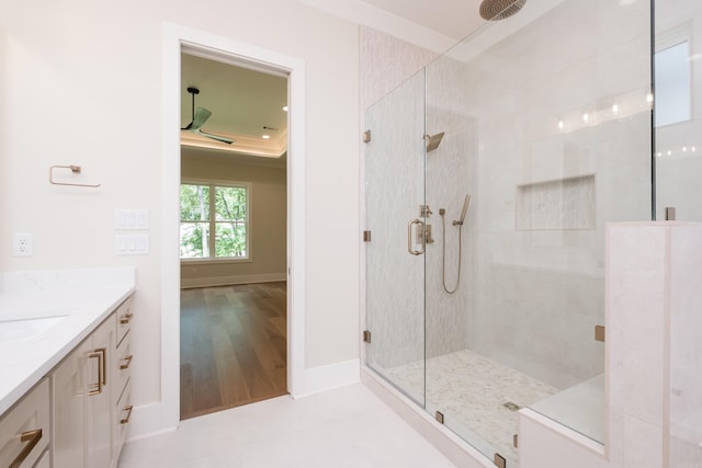 219 Abington Cir, Little Rock, AR 72223 - full bathroom featuring vanity, baseboards, a shower stall, and wood finished floors