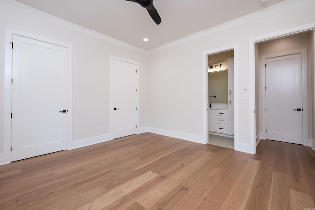 219 Abington Cir, Little Rock, AR 72223 - unfurnished bedroom with ensuite bath, ornamental molding, baseboards, and light wood-style flooring