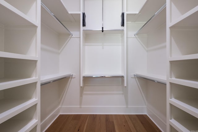 219 Abington Cir, Little Rock, AR 72223 - spacious closet featuring dark wood-style flooring