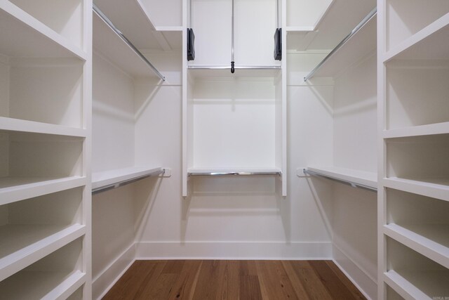 219 Abington Cir, Little Rock, AR 72223 - spacious closet featuring dark wood-style flooring