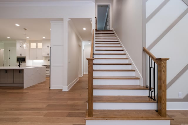 219 Abington Cir, Little Rock, AR 72223 - stairway featuring baseboards, recessed lighting, and wood finished floors