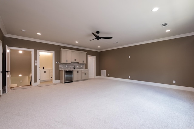 219 Abington Cir, Little Rock, AR 72223 - unfurnished living room featuring ceiling fan, crown molding, and visible vents