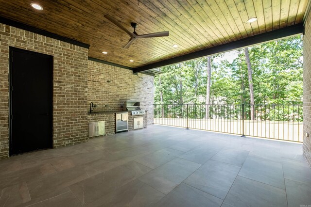 219 Abington Cir, Little Rock, AR 72223 - view of patio featuring a ceiling fan, an outdoor kitchen, and a grill