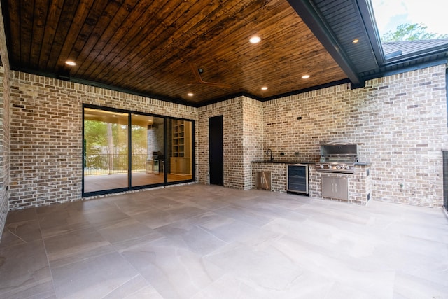219 Abington Cir, Little Rock, AR 72223 - view of patio / terrace featuring wine cooler, grilling area, and an outdoor kitchen