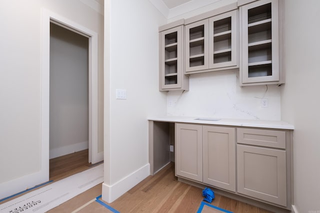 219 Abington Cir, Little Rock, AR 72223 - bar featuring light wood finished floors and baseboards