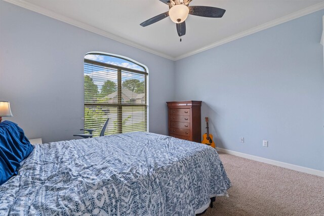 109 Sandstone Cv, Sherwood, AR 72120 - carpeted bedroom featuring crown molding, baseboards, and ceiling fan