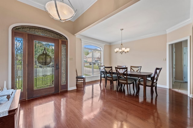 109 Sandstone Cv, Sherwood, AR 72120 - foyer entrance featuring wood finished floors, a notable chandelier, and crown molding
