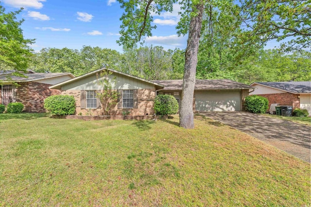 8302 Merriwood Ct, Sherwood, AR 72120 - single story home with brick siding, a front yard, driveway, and a garage