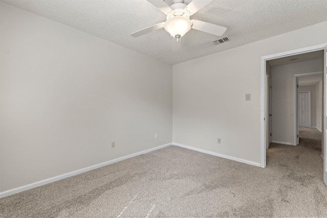 8302 Merriwood Ct, Sherwood, AR 72120 - carpeted spare room with baseboards, a ceiling fan, a textured ceiling, and visible vents