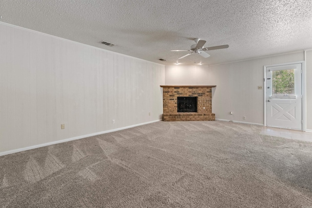 8302 Merriwood Ct, Sherwood, AR 72120 - unfurnished living room featuring visible vents, carpet flooring, a textured ceiling, and ceiling fan