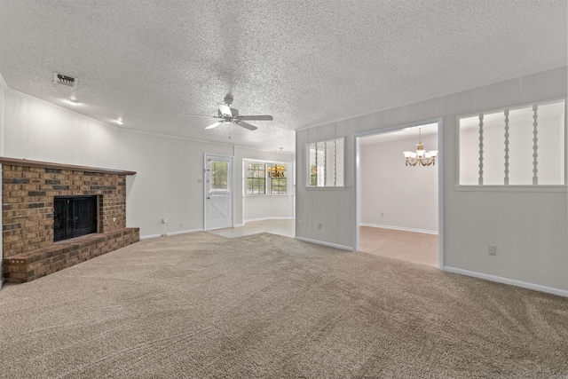 8302 Merriwood Ct, Sherwood, AR 72120 - unfurnished living room with a brick fireplace, visible vents, carpet floors, a textured ceiling, and ceiling fan with notable chandelier