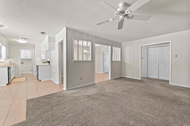 8302 Merriwood Ct, Sherwood, AR 72120 - unfurnished living room featuring a ceiling fan, a textured ceiling, and crown molding